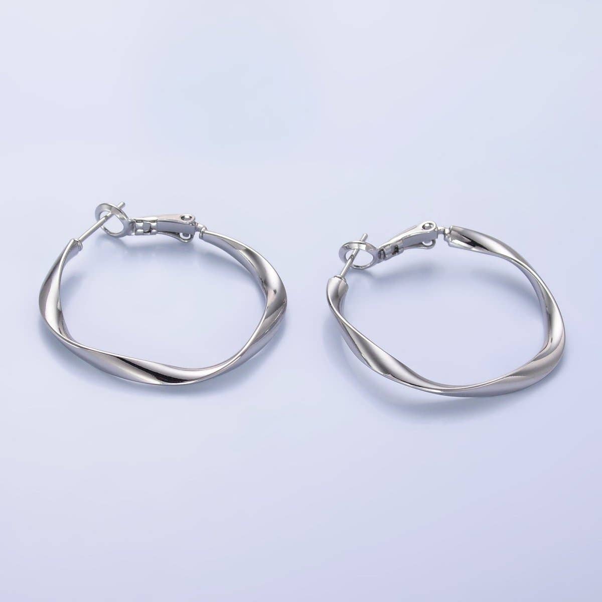 Twisted Hoop Earrings - Silver